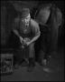 Photograph: [Blacksmith shoeing horse]