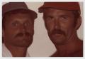 Photograph: [Terry Tebedo and Bill Nelson with visors]