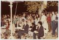 Photograph: [A crowd sitting or standing in event]