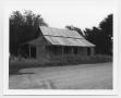 Photograph: [Building With a Corrugated Tin Roof]