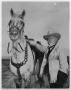 Photograph: [Photograph of Sam Myres and a horse]