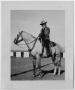 Photograph: [Photograph of Sam Myres on top of a horse]