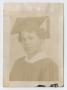 Photograph: Young woman in graduation cap and gown