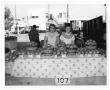 Photograph: [Two Girls Displaying Tomatoes]
