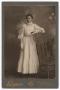 Photograph: [Unknown Woman Wearing All Light Color Clothing]