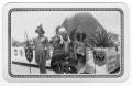 Photograph: [Men in costume for a parade]