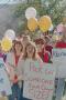 Photograph: [People Holding Signs and Balloons at Pro-Life Rally and March]
