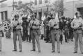 Photograph: [Police Officers Holding Batons at KKK Rally]