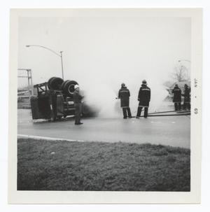 [Firefighters at a Vehicle Fire]