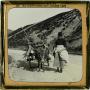 Photograph: Glass Slide of an Irishwoman and Donkey Cart