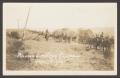 Postcard: [Cavalry Men on Wagons]