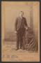 Photograph: [Photograph of a Man in Dark Clothing]