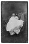 Photograph: [Baby in Large White Garment]