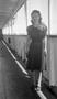 Photograph: [Woman Posing on a Ship's Deck #1]