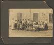 Photograph: [Beulah Hale and Forrest Hudson with Schoolchildren]