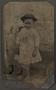 Photograph: [Photograph of a Child Wearing a Derby Hat]