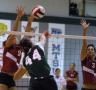 Photograph: [Girl Hitting a Volleyball]