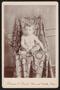 Photograph: [Portrait of an Unknown Toddler in a Blanket-Covered Chair]