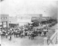 Photograph: Wagons Passing Down Main Street