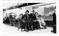 Photograph: [Col. Hugh B. Moore and ladies on board a ship]