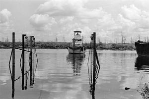 Primary view of object titled '[Boat Being Lifted from the Neches River]'.