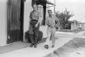 Photograph: [Jack Lewis and Friend "Shorty" Leaving Work]