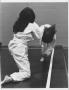 Photograph: Two Female Students Sparring in Karate Class