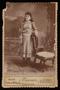 Photograph: [Portrait of an Unknown Young Woman Next to a Chair]