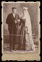 Photograph: [Portrait of an Unknown Couple in Wedding Attire]