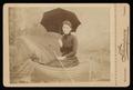 Photograph: [Portrait of an Unknown Woman in a Fake Boat]