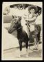 Photograph: [Robert Parker Kelly, Jr., Riding a Pony]
