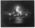 Photograph: [The exterior of the Capitol building at night]