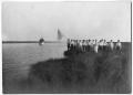 Photograph: [Photograph of Men Gathered on a Bank, 1899]