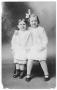 Postcard: [Portrait of two children]