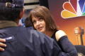Photograph: [Gabriela Spanic as seen from behind a person in line]