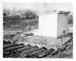 Photograph: [Sewer site with building]