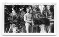 Photograph: "Buddy" standing next to pond Orlando 1942