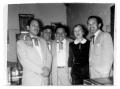 Photograph: Four men and a woman