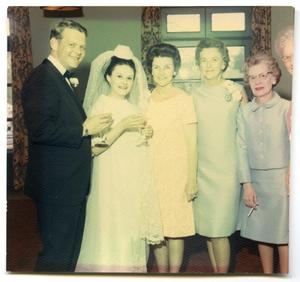 [Tom and Joann Kearn on their wedding day with Betty Scrivner and Helen Dickson]