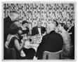 Photograph: [E.W. Brown having Supper with Friends]