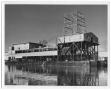 Photograph: [Photograph of Large Building on Water]