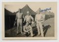 Photograph: [Four Soldiers Outside Camp]
