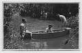 Photograph: [Three Men in a Canoe]