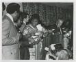 Photograph: [Barbara Jordan Surrounded by Guests]