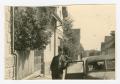Photograph: [Soldier Leaning on a Car Door]