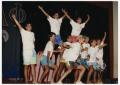 Photograph: [Photograph of Students Preforming on Stage]