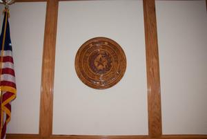 Primary view of [Wooden Plaque on a Wall]