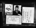 Photograph: Images of Oswald in Uniform, Baby, Social Security Card, and Fair Pla…