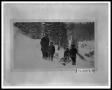 Photograph: Four Men with Sled on Mountainside