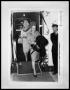 Photograph: Two Women Coming Aboard RMS. Queen Elizabeth and Man Standing by